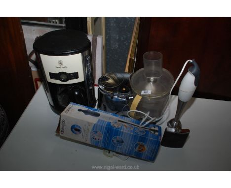 A Russell Hobbs coffee machine and a Kenwood food processor and stick blender. 