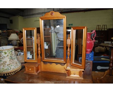 A dressing table triptych mirror with 2 drawers.