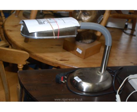 A stainless steel Daylight Desk lamp model no. D3943.