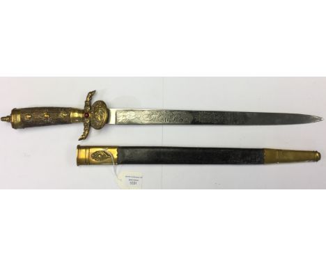 Hunting Cutlass with single edged 41cm long blade with etched decoration to both sides of the blade showing hunting scenes. M