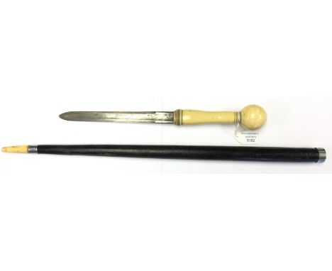 British Indian Army 1880's swagger stick with dagger. Ivory knob and cuff 14cm long, ebonised shaft with ivory foot. Plated s