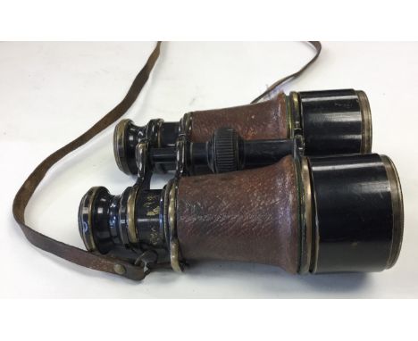 WW1 British Mk V Special Binoculars. Broad Arrow marked. Serial number 30651. Brown leather covered body. Complete with slide