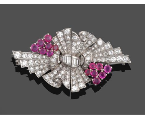 A Ruby and Diamond Double Clip Brooch, circa 1940's, formed of a bow motif centrally with spray detail, each clip set through
