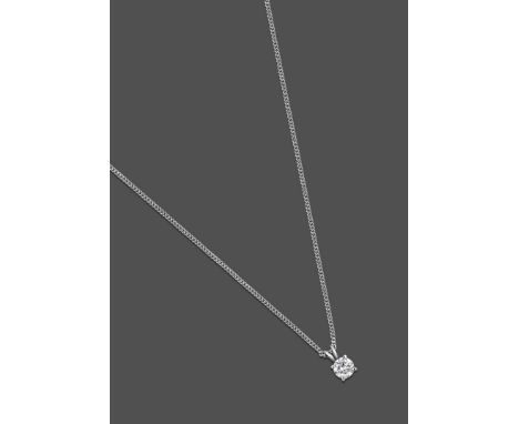 A Diamond Solitaire Pendant on A 9 Carat Gold Chain, a round brilliant cut diamond in a white claw setting, on a trace link c