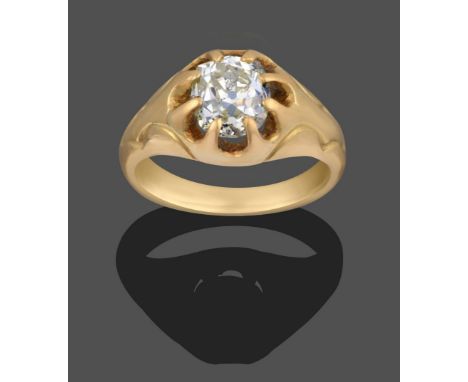 A 14 Carat Gold Gentleman's Diamond Solitaire Ring, the old cut diamond in a yellow claw scalloped edge engraved shoulder sha