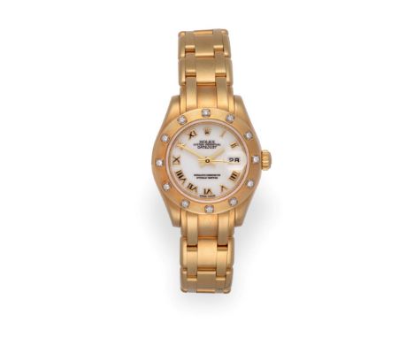 A Lady's 18 Carat Gold Diamond Set Wristwatch, signed Rolex, Oyster Perpetual, Superlative Chronometer Officially Certified, 