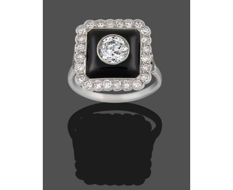 An Art Deco Onyx and Diamond Cluster Ring, an old cut diamond centres a square onyx plaque within a border of eight-cut diamo