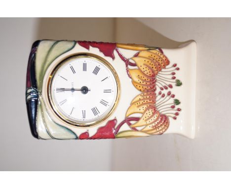 Moorcroft mantel clock in the Anna Lily pattern, height 15cm 