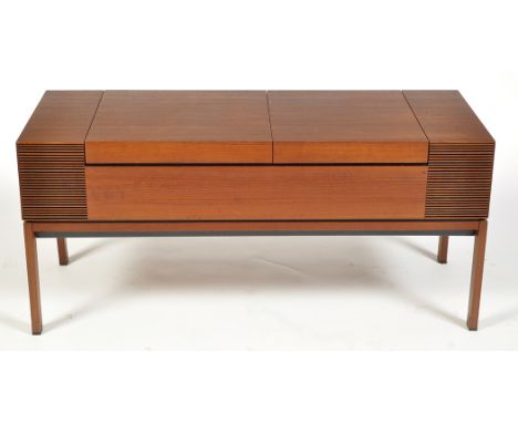 A vintage Bang & Olufsen (Danish) Beomaster 900 music system, in teak cabinet, with two lift-up covers, rectangular section l