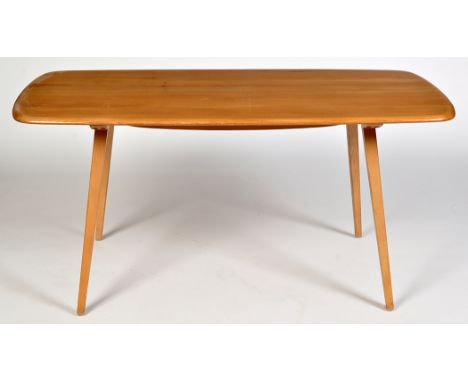 Ercol: a light elm and beech wood dining table, the rectangular top on splayed square tapering legs, 150 x 76 x 72cms high.