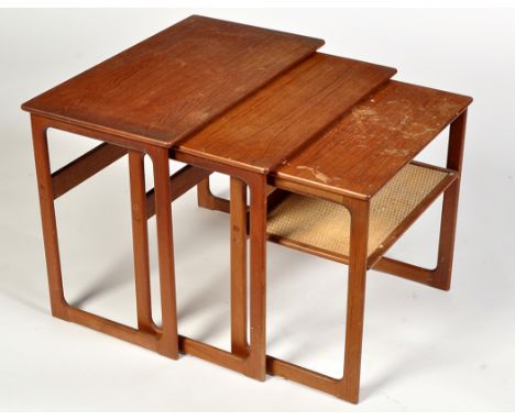 Silkeborg: a 1970's Danish nest of tables, the smallest with caned shelf, the largest table, 65 x 52cms high.