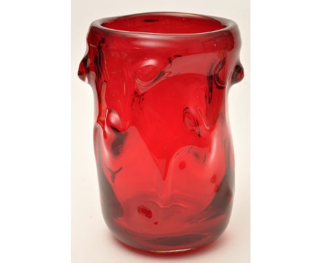 William Wilson and Harry Dyer, for Whitefriars: a 'Knobbly' ruby glass vase, 24cms (9 1/2in.) high.