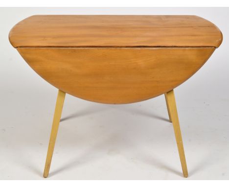 Ercol: a light elm and beech wood drop leaf dining table, 112 x 72cms high.