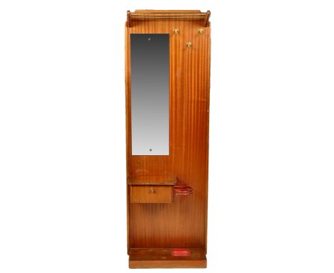 A mid 20th Century teak hall stand, with rails and hooks above a rectangular mirror, single compartment and stick receiver be