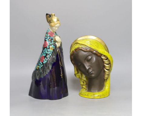 Emilie Schleiss (1880-1962), two ceramic figures including a wall mask and church goer figure