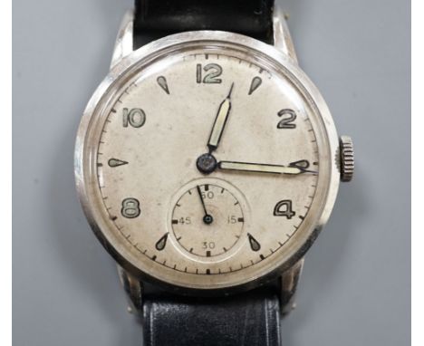 A gentleman's stainless steel manual wind wrist watch, the case and movement signed Rolex, on associated leather strap, the c