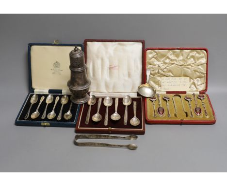 Two cased sets of six silver teaspoons including Art Deco and a cased set of Scandinavian gilt white metal and enamel coffee 