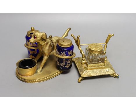 A gilt metal ‘dog’ desk stand together with a similar French style inkwell. Longest 15cm