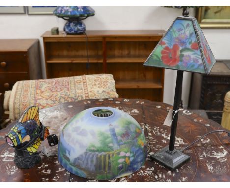 A Tiffany style fish lamp, height 24cm together with one other and a glass shade