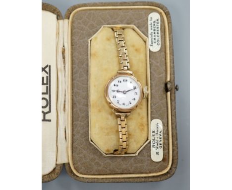 A lady's early 20th century 9ct gold Rolex manual wind wrist watch, on an associated 9ct gold bracelet,gross weight 17.8 gram