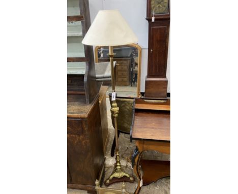 A brass lamp standard, height 150cm