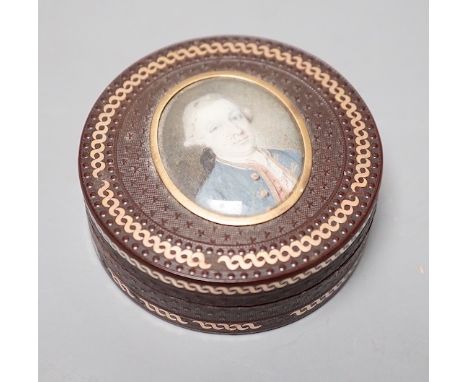 A 19th century pressed bois durci and gilt metal snuff box with painted miniature portrait of a gentleman on ivory to cover. 