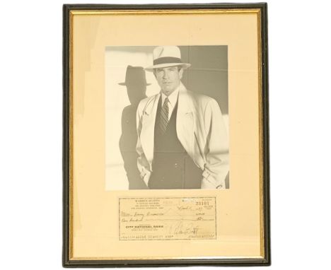 Warren Beatty signed cheque dated 1977 with black and white photo, framed measures 12 inch by 16-inch appx. Good condition Es