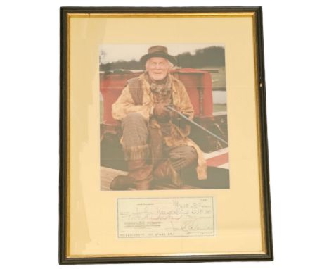 Jack Palance signed cheque dated 19982 with colour photo, framed measures 12 inch by 16-inch appx. Good condition Est. Good c