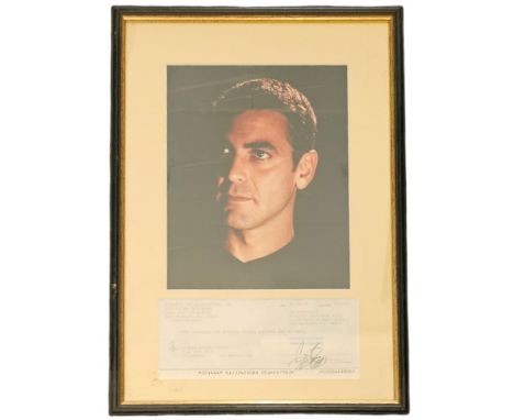 George Clooney signed cheque dated 1995 with colour photo, framed measures 12 inch by 17-inch appx. Good condition Est. Good 
