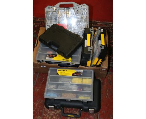 A box of cased tools to include draper tap and die set, router bits, drill bit sets, Torque socket set, various bolts screws 