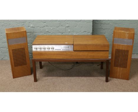 A Ferguson hifi system with record player along with two speakers.