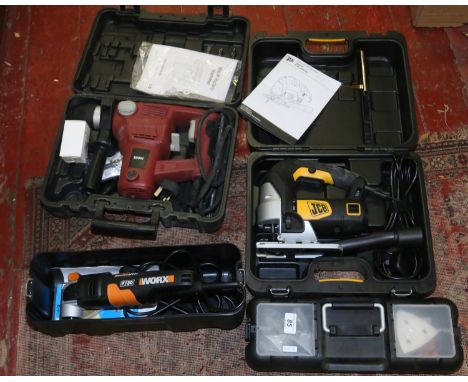 Three cased 230 volt power tools, 900 watt rotary hammer drill, a JCB jigsaw JS650L and a Worx Sonicrafter.