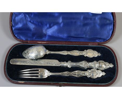 A Victorian cased silver christening set comprising of a knife, fork and spoon, assayed Sheffield 1855 by Martin Hall & Co. g