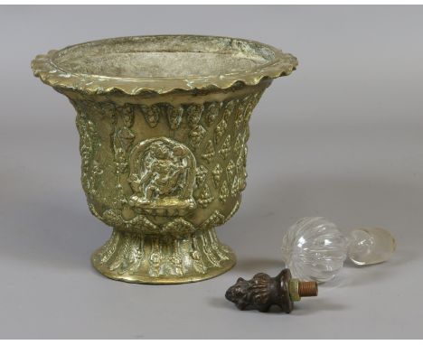 An Indian bronze small planter with flared rim and decorated in relief with deities.