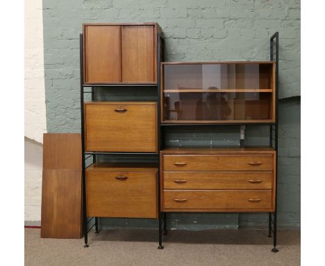 A retro Staples Ladderax teak shelf and display unit.