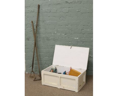 A painted wooden tool chest, a quantity of tools and gardening tools.