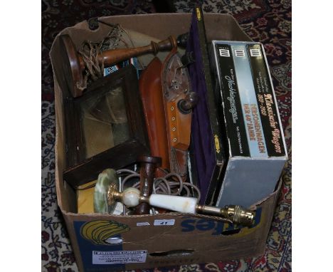 A box of miscellaneous including meat serving set, boat lamp, small oak mirror, wall light etc.