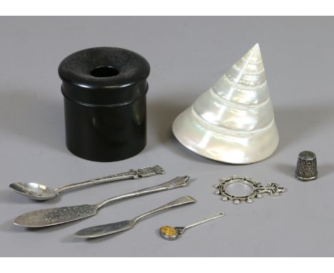 A small quantity of silver items including two conserve spoons one Victorian assayed London 1891, along with an ebony hat pin