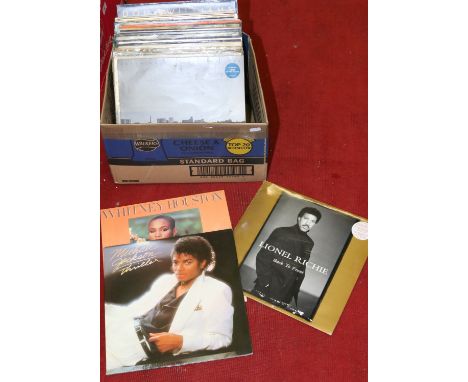 A small collection of L.P records 1960s and 70s including Michael Jackson, Buddy Holly, Lionel Richie and Whitney Houston.
