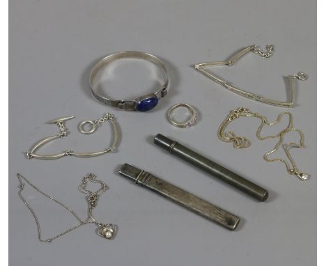 A small collection of silver to include bracelet marked 925, bangle mark rubbed, two pencil cases, stone set ring marked 925 