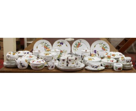 A large service of Royal Worcester Evesham pattern dinner and teawares including tureens, ramekins, cups and saucers etc. app