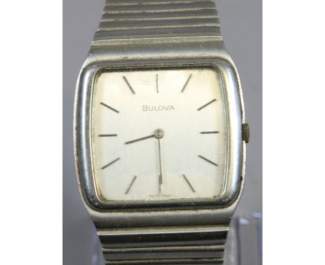 A gentleman's stainless steel Bulova manual bracelet watch with square dial and baton markers.