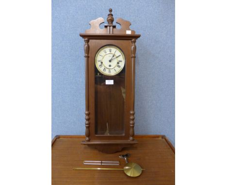 A Hermle mahogany wall clock 
