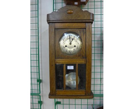 An oak wall clock 