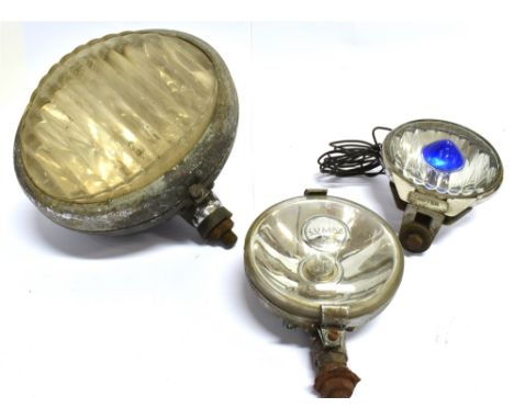 A LARGE OVAL NOTEK FOG MASTER LAMP  with ribbed glass lens and chrome shell, as used on pre-war Bentleys, 9' x 8' together wi