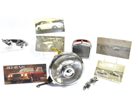 JAGUAR - A COLLECTION OF JAGUAR RELATED ITEMS  including a car mascot 19cm long, another 13cm long, a 1960's plastic desk tid