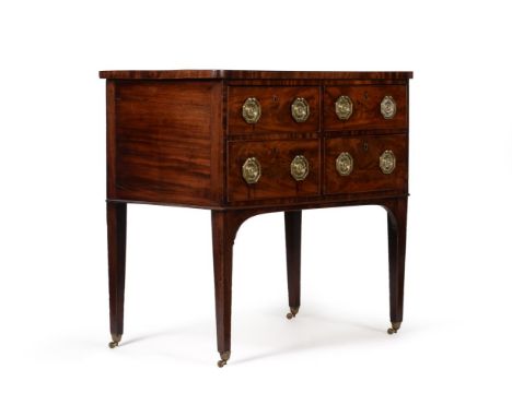 AN UNUSUAL GEORGE III MAHOGANY CHEST OF DRAWERSCIRCA 1790With tapering square legs85cm high, 87cm wide, 55cm deepProvenance: 
