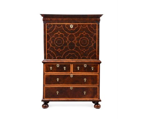 A WILLIAM III WALNUT OYSTER VENEERED AND HOLLY INLAID ESCRITOIRE CIRCA 1700The cushion drawer above the fall enclosing drawer