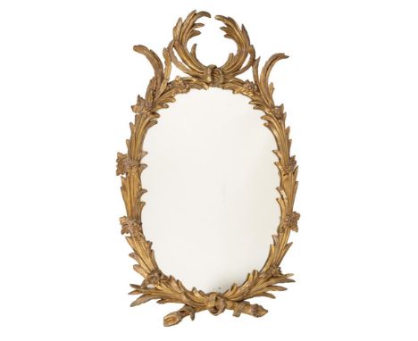 A GEORGE III GILTWOOD WALL MIRRORIN THE MANNER OF JOHN LINNELL, CIRCA 1780The frame carved in the form of ribbon tied palm fr