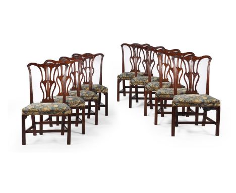 A SET OF NINE GEORGE III MAHOGANY DINING CHAIRS IN THE MANNER OF THOMAS CHIPPENDALE, CIRCA 1770 The seat rails stamped 'WH'95